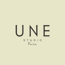 UNE
